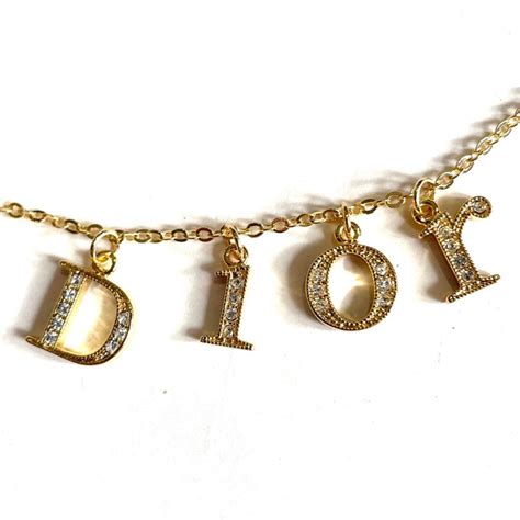 dior revolution necklace|dior spellout necklace.